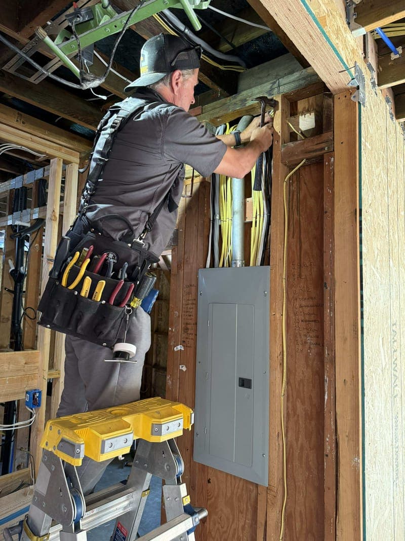 MIZO Electric technician completing professional electrical work
